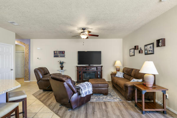 7023 TOMBSTONE RD NW, ALBUQUERQUE, NM 87114, photo 4 of 25